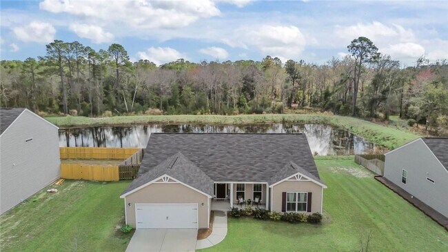 Building Photo - Relax & Unwind at this 4-Bedroom Home with Scenic Lagoon Views in Rincon