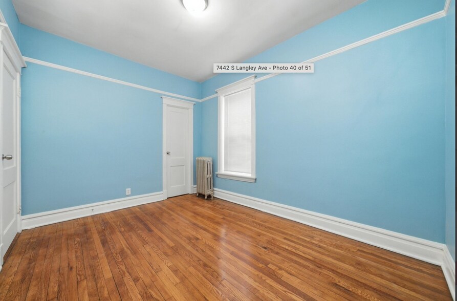 Building Photo - 7442 S Langley Ave