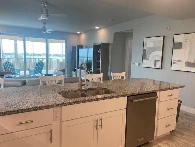 Building Photo - Coastal Luxury at Hidden Bay | 3BR Waterfront Condo with Bay Views