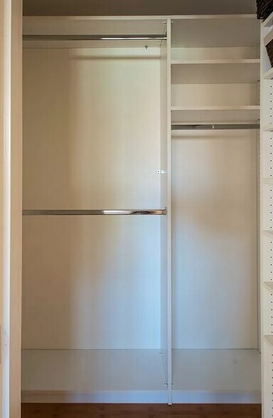Built in adjustable shelving and bars in both closets. - 324 Van Buren St