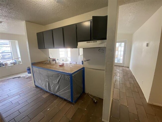 Building Photo - Large 2/2 duplex with a 2 car carport