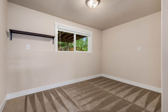Building Photo - Updated Split-Level Home with Flexible Living Spaces & Backyard Deck
