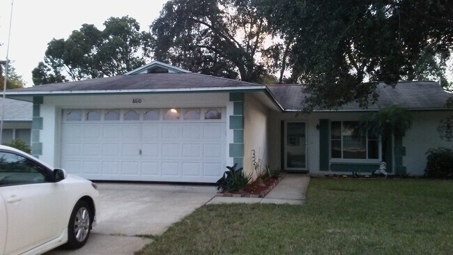 Building Photo - 8610 Winding Wood Dr