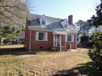 Building Photo - 3 BR/ 1.5 BA Brick Three Bedroom Cape Cod ...