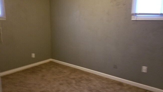 Building Photo - NE 3 bedroom updated with appliances and garage