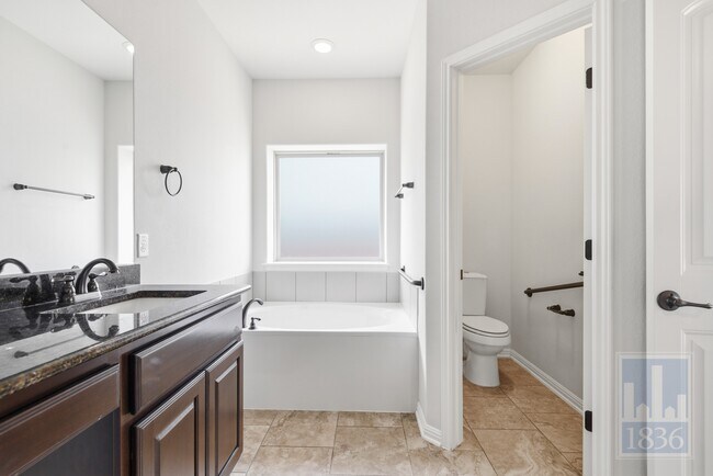 Building Photo - 8336 Paola St