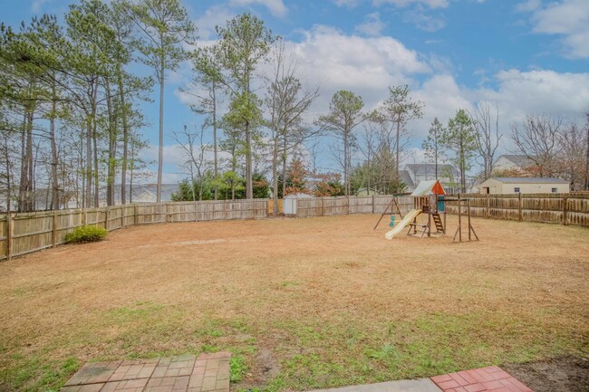 Building Photo - "Charming 4-Bedroom Home with Granite Coun...