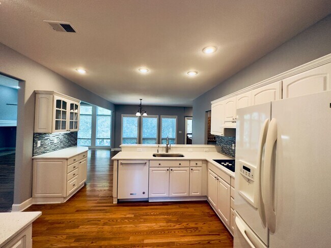 Building Photo - {6411} Enchanted Lake Estates + Updated Kitchen, Fresh Paint Throughout +  Main Floor Primary Bed...