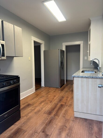 kitchen with double door fridgiei - 1411 Beechview Ave