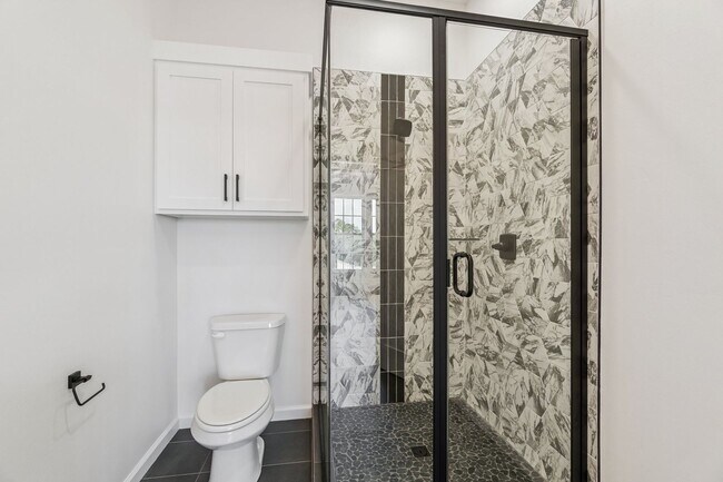 Building Photo - Minimalist Magic: 2-Bed Apartment Over Sel...