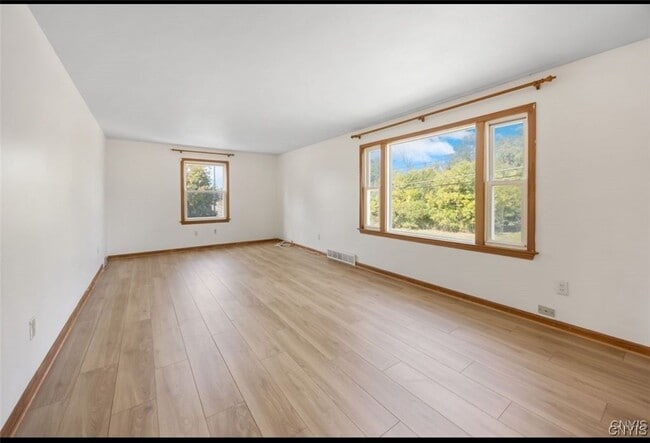 Building Photo - 5696 Caughdenoy Rd