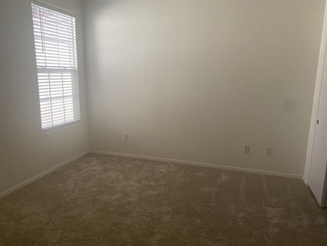 Building Photo - 310 W McCoy Ln