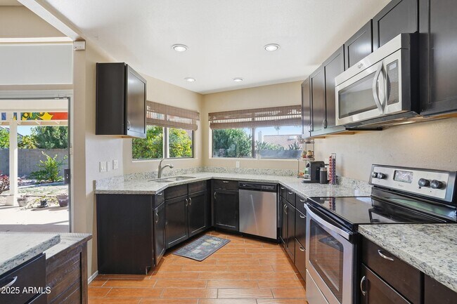 Building Photo - 5713 E Nisbet Rd