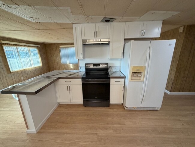 Building Photo - Retire in Style: Your Dream Home in one of...