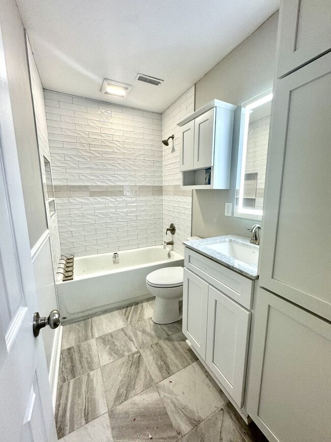 Building Photo - Available for Short-Term Only!