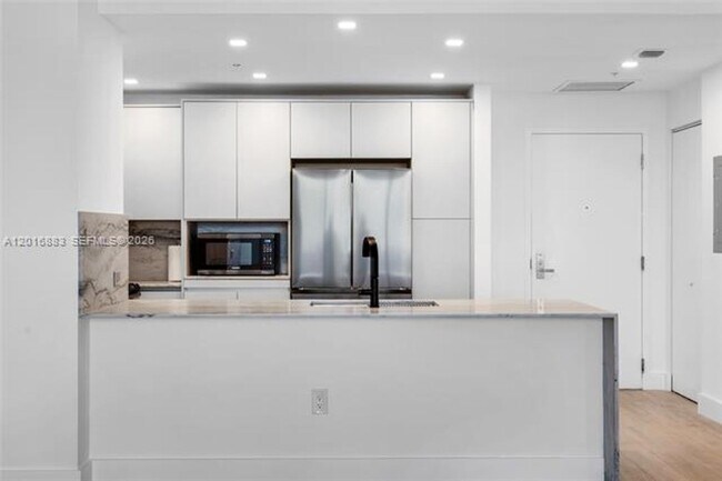 Building Photo - 7901 Hispanola Ave