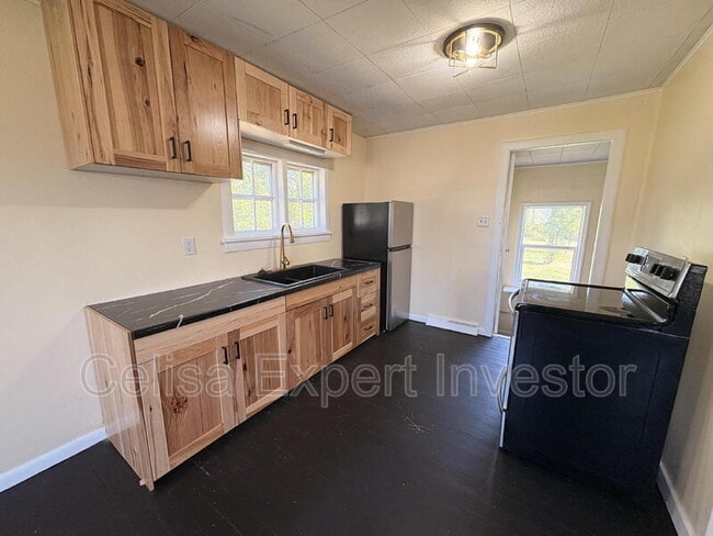 Building Photo - 6418 Huguenard Rd