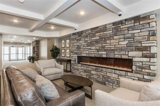 Building Photo - LUXURY CONDO - AVAILABLE NOW - MOVE IN PROMO