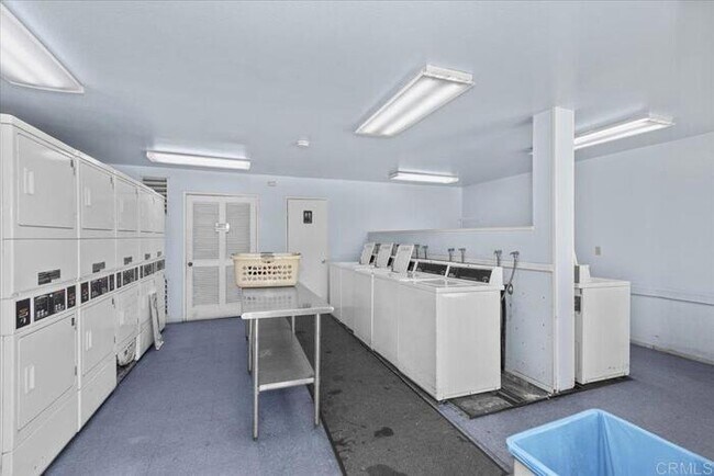 Building Photo - Poolside Living at Its Finest – Turnkey 3BR Condo with Direct Patio Access to the Pool