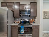 Building Photo - Affordable Comfort with Modern Style!