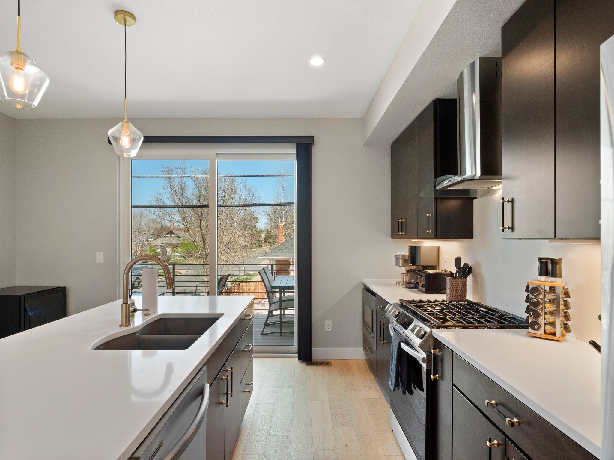 Modern kitchen w outdoor dining - 3840 Eliot St