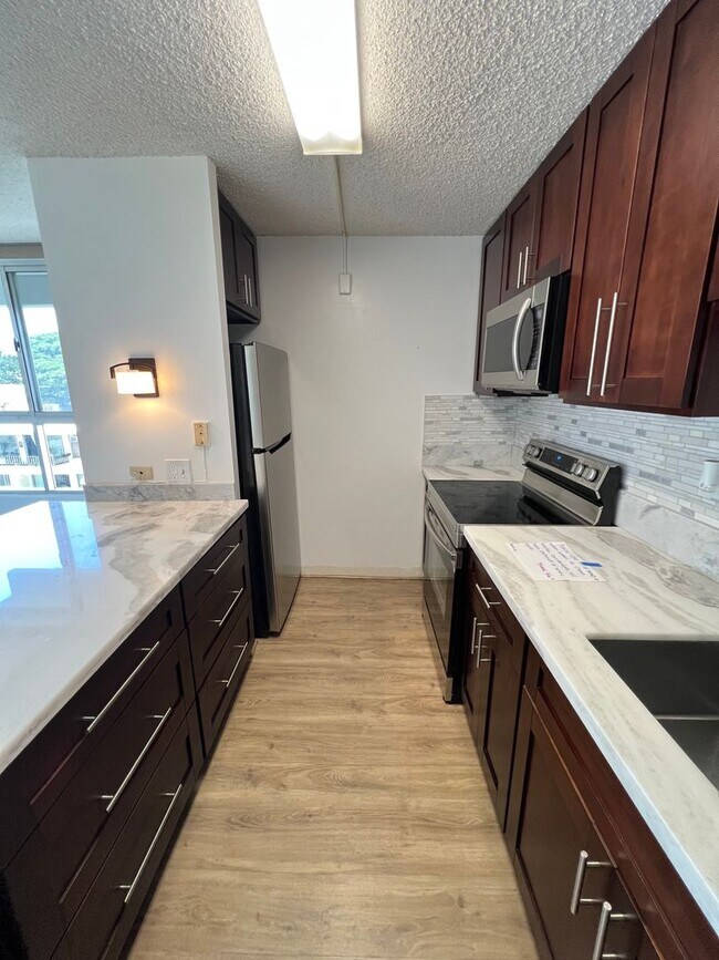 Building Photo - A/C. Two Parking Stalls. Swimming Pool. Pet Friendly. (RRLLC)