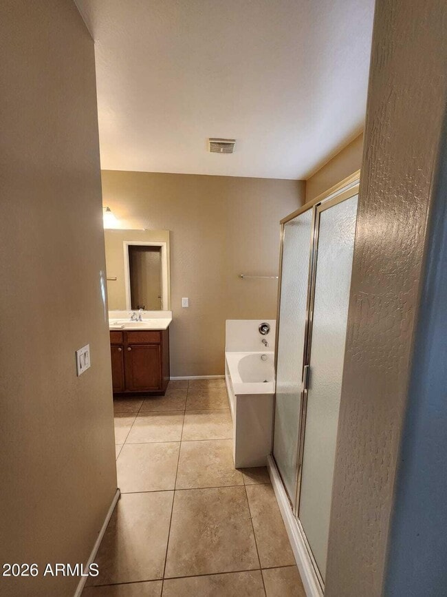 Building Photo - 7643 W Charter Oak Rd