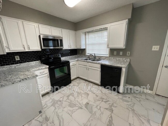 Building Photo - 6989 Amberly Way Dr