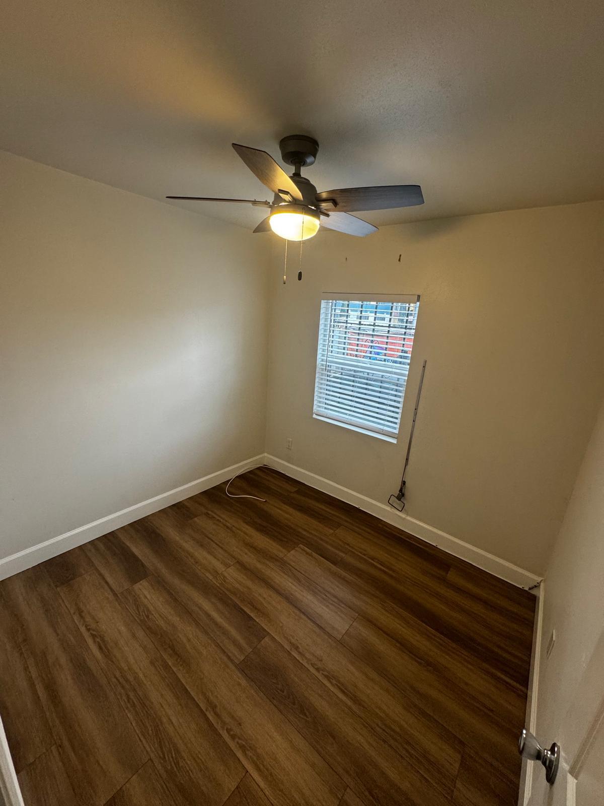 Building Photo - 8765 S San Pedro St