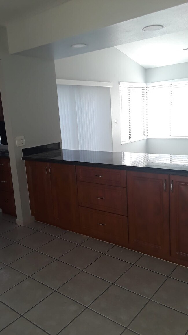 Separate dining room from living room - 16808 Patio Village Ln