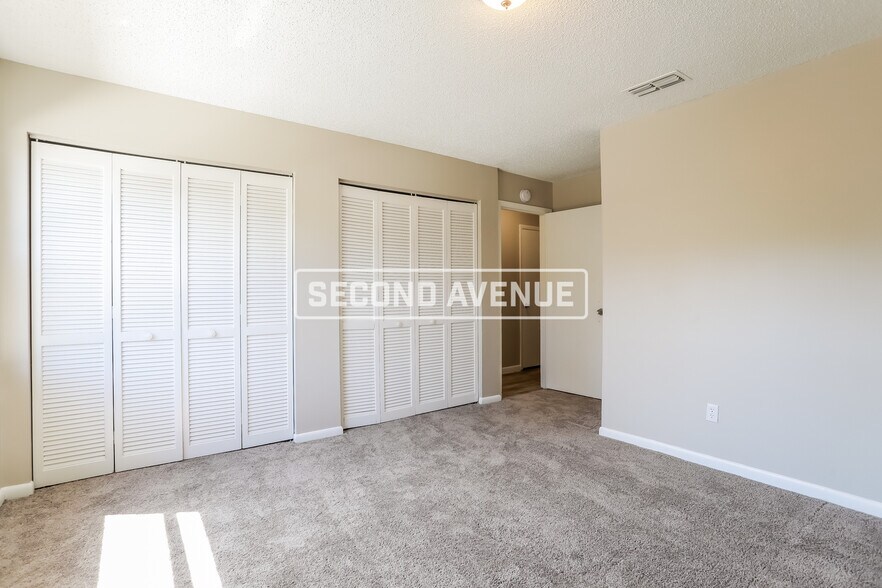 Building Photo - 8781 Whispering Pines Dr