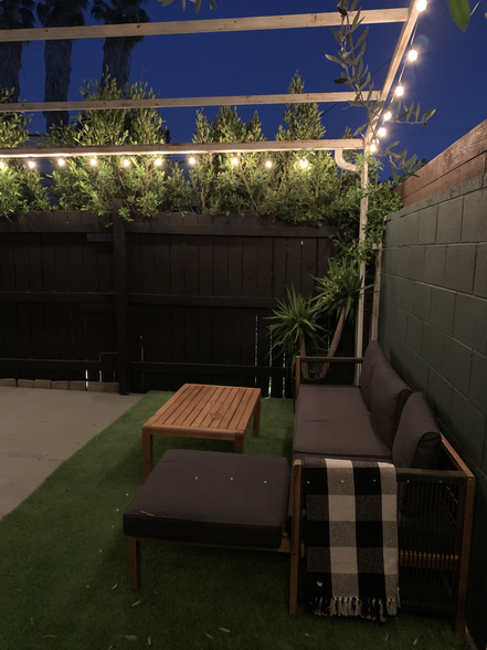 Private patio at night - 719 N Formosa Ave