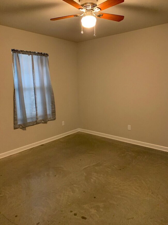 Building Photo - 6125 Mark Lebleu Rd