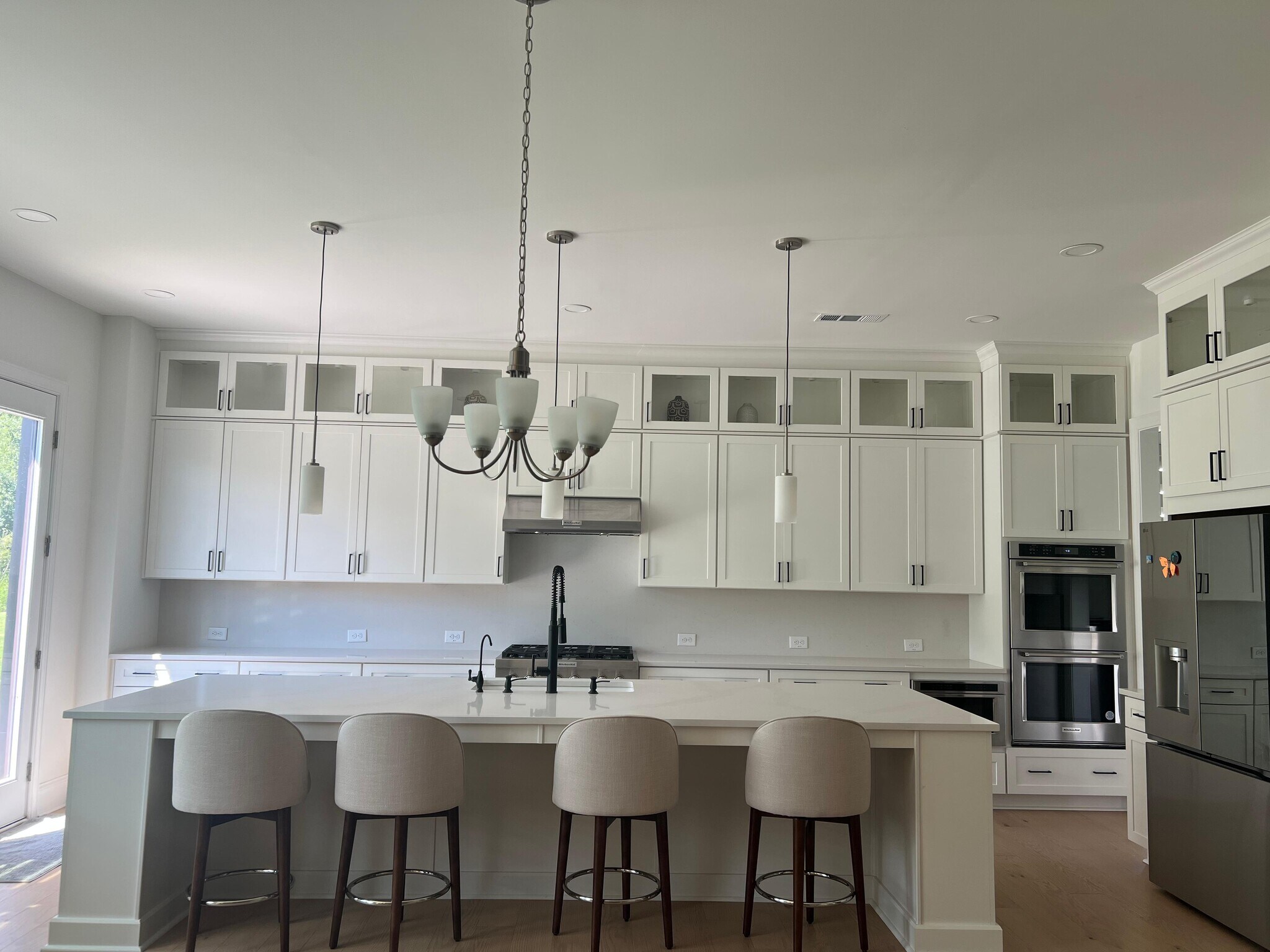 luxury kitchen with to the ceiling cabinets - 6490 Pond View Dr