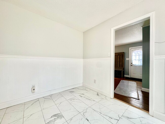 Building Photo - Updated 3BR Ranch | Large Lot, Deck & Modern Finishes – Minutes to Durham