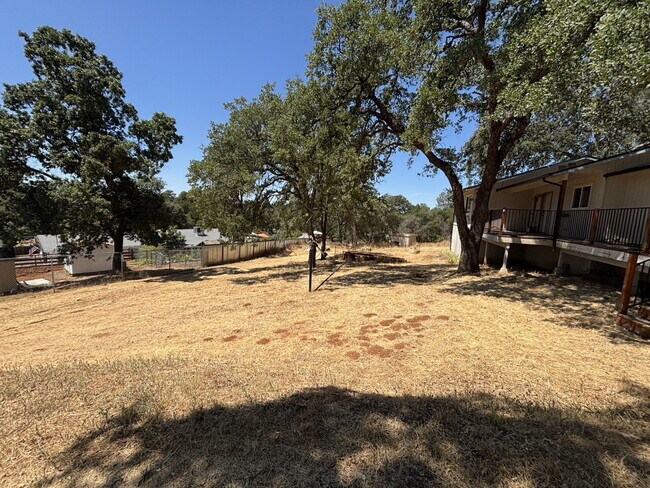 Building Photo - Fully remodeled home nestled on a spacious...