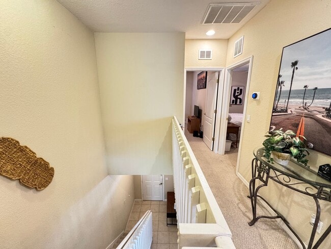 Building Photo - Fully Furnished 5-Bed End-Unit Townhome with Hot Tub in Gated Coral Cay! WASHER & DRYER INCLUDED!