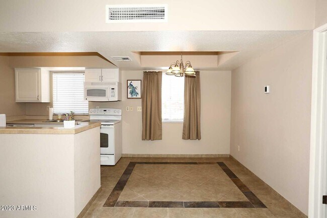 Building Photo - 4554 E Paradise Village Pkwy N