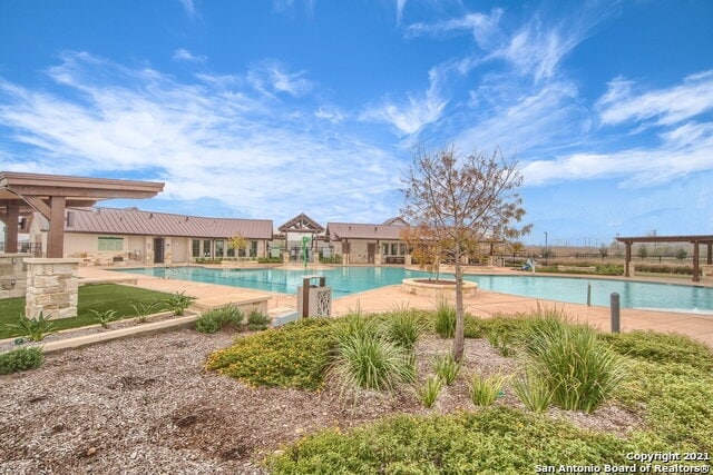 Building Photo - Welcome to this beautifully maintained 4-bedroom, 2-bathroom home in the highly desirable Whisper...