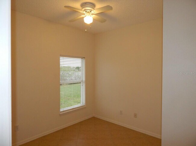 Building Photo - **Charming 4BR/2BA Pond-View Home with Boat Ramp Access – East Orlando **