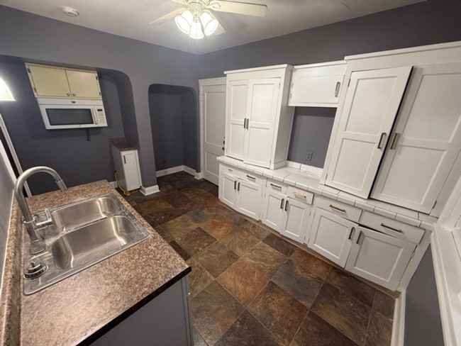 Building Photo - ? Updated 4BR/2BA Single-Family Home — Garage Parking, Water & Lawn Care Included ?