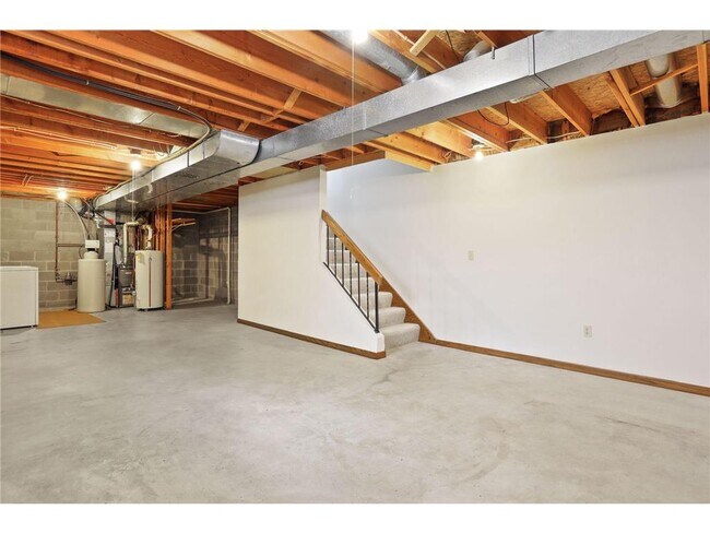 Even more square footage on lower level! Professionally cleaned & Storage Galore! - 1411 10th Ave E