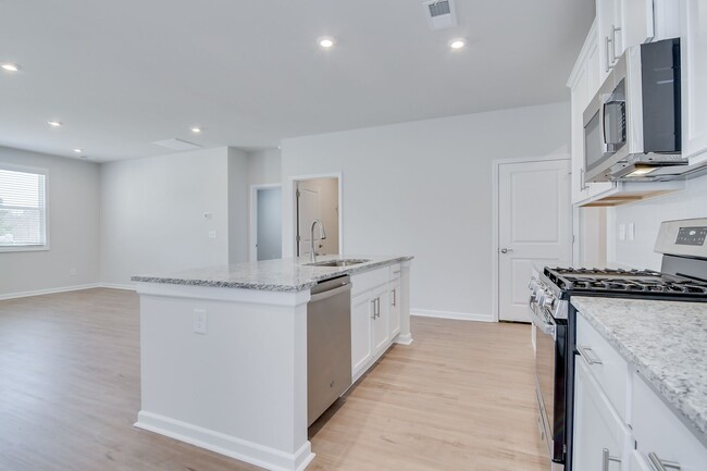 Building Photo - Stunning 4-Bedroom, 3-Bath New Construction Home with Master on Main and Upstairs Retreat