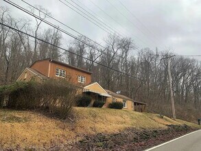 Building Photo - Introducing this attractively updated 4-bedroom, 1-bath home on Poketa Rd.