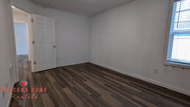 Building Photo - 4 bedroom home with air conditioning - Great location!!!  HUGE basement for your man cave or she ...