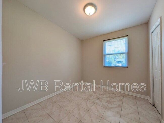 Building Photo - 9064 11th Ave