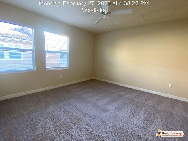 Building Photo - Pristine Condo with New Carpet and Dual Master Suites