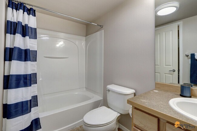 Building Photo - East Anchorage Home with Utilities Included!! Close to JBER! Attached Two Car Garage + Fenced in ...