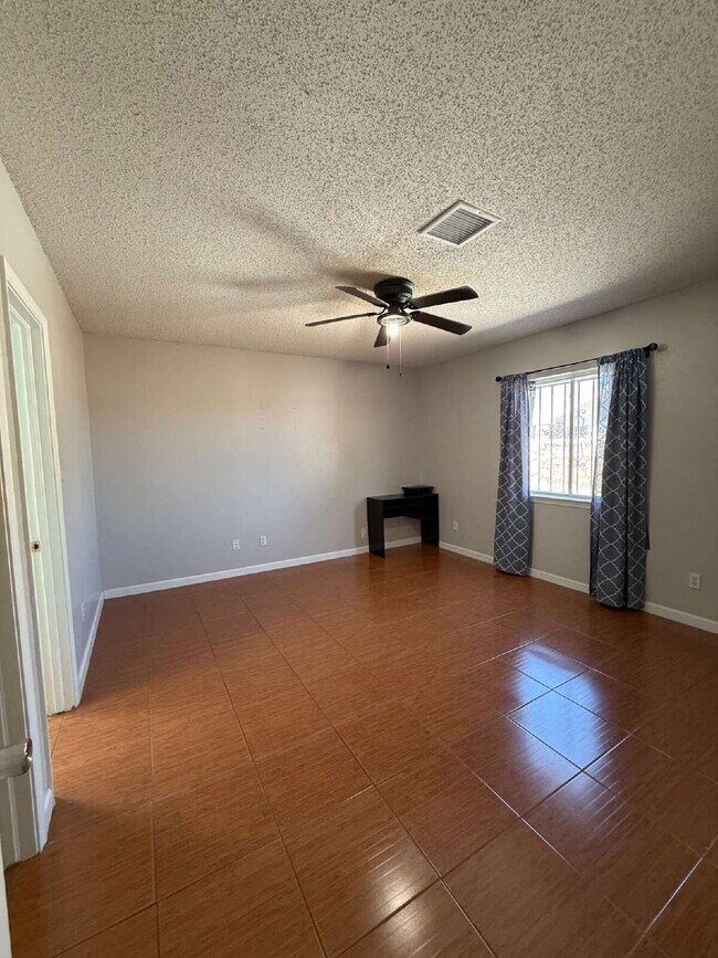 Building Photo - Well, kept three-bedroom, two baths home with Solar Panels. A must see, lease today! 11797 Imperi...