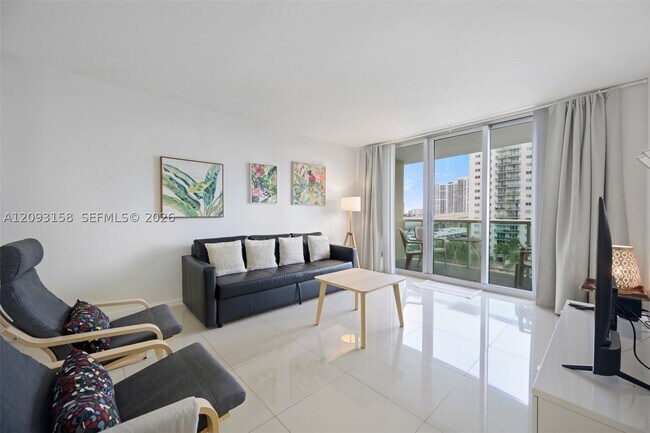 Building Photo - 19370 Collins Ave